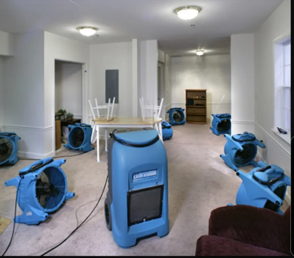 Air movers and dehumidifier setup for Water Damage Restoration in Crafton